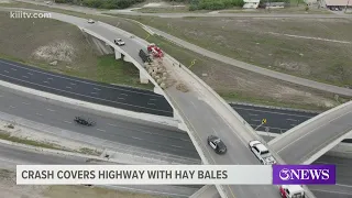 Over pass at Highway 77 and Interstate 37 has been blocked off due a traffic accident involving hay