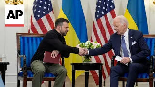 Biden apologizes for holding approval of weapons for Ukraine in Paris meeting with Zelenskyy