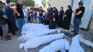 Families grieve as funeral is held for Palestinians killed in Deir al-Balah