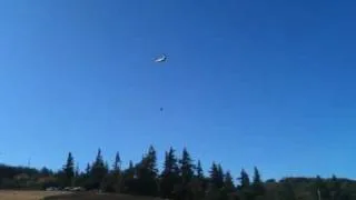 Chinook dropping water on microwave fire