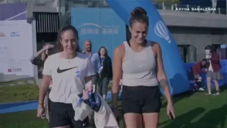 Aryna Sabalenka and Daria Kasatkina with BPFC football team.