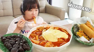 Mukbang :) Spicy cheese tteokbokki with a lot of cheese on it.