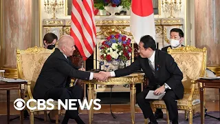 Biden greeted by Japan's prime minister in Tokyo