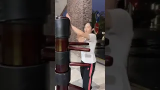 Wing Chun Girl Wooden Dummy Free Style Practice