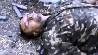 Терористи показують трупи українських військових