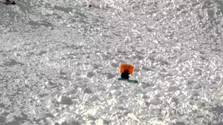 Snowboarder's avalanche encounter caught on tape