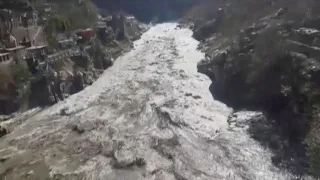 Himalayan glacier breaks in northern India, flooding power plant and homes