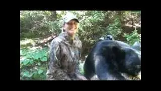 Lady takes her first Big Black Bear with a bow in Ontario Canada good impact !