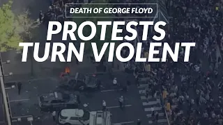 Police vehicles set ablaze as George Floyd protest turns violent in Philadelphia.