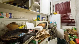 Abandoned Apartment Building With Power and a Filthy Hoarder Unit Inside!!