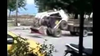 Bobcat Loads Itself onto Truck