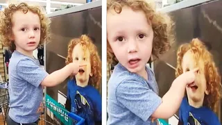 Little Boy Spots His Doppelganger on a Poster at Walmart