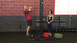 Sandbag Over Bar | Empowered Strength Ft. John Odden & Kelly McGinnis