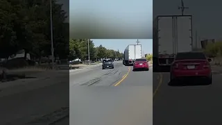 Reckless Idiot Almost Crashes [Uses Center Turn Lane To Pass Turning Big Rig] #shortvideo