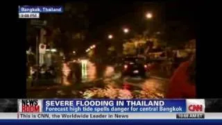 Thai flood waters prompt exodus