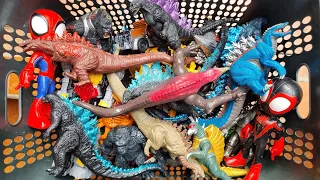 Godzilla monster figure, skull crawler, king ghidorah, king kong, dragon, dinosaur