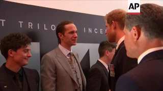 Prince Harry chats with Harry Styles and other stars of the film 'Dunkirk' at London premiere