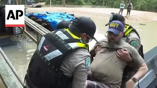 Texans are rescued from flood waters