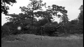 The U.S. 127th Field Artillery Regiment Battery B fires Howitzers during World Wa...HD Stock Footage