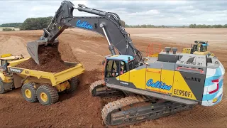 Volvo EC950F Excavator Loading A60H ADTs