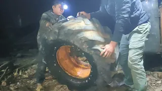 Rescue wheel loader tires at night