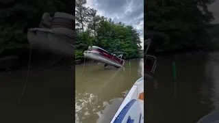 Pontoon Boat hits big rock