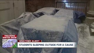 Students sleep outside in the cold for a good cause