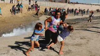 Hundreds of migrants try to storm U.S. border