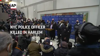 Officials on killing of police officer in Harlem