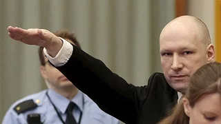 Mass killer Anders Breivik makes Nazi salute in court