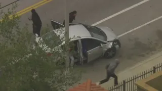 Suspects bolt from car after police chase in South Bay