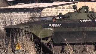 Ukraine troops pull out of strategic town of Debaltseve
