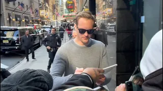 The Northman star Alexander Skarsgard signs autographs for fans outside of GMA in NYC