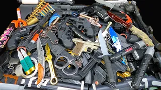 A Lot of Toy Guns - Toy Pistols in the Box.