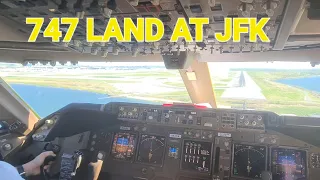 JFK Airport: BOEING 747 LANDING.  Flying low over the water,  and LAND on runaway 04R. windy day
