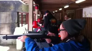 Ashley shooting Ruger 10/22 for the first time.