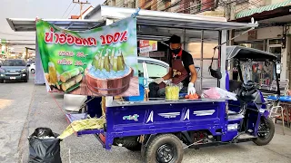 Sugarcane Juice Vendor with Machine Thai Street Food