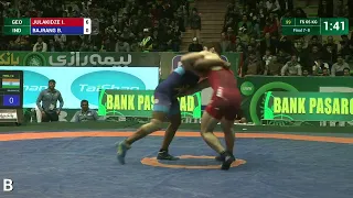 Final 7-8 FS - 65 kg: B. BAJRANG (IND) df. I. JULAKIDZE (GEO) by TF, 16-6