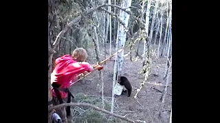 12 year old smokes a Black Bear with the LONG BOW!! - Archery Black Bear Hunting