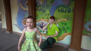 Mini Tinker Bell Gives Peter Pan a KISS...and a Christmas Card at Magic Kingdom!