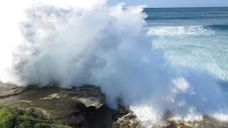 Massive Surf, Surfer Washed onto Rocks - By Cora Bezemer