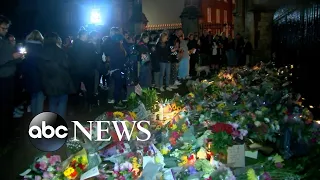 Mourners gather at Buckingham Palace to pay their respects to the Royal Family