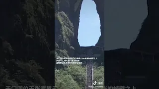 The First Chinese Flying through Tianmen Cave in a Wingsuit