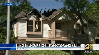 Challenger widow's home goes up in flames