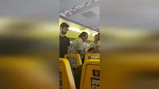Shocking video shows "intoxicated" Ryanair passenger being restrained by seven people mid-flight