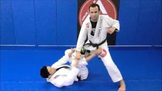 Gracie Barra Downers Grove video1 deflecting the Dela Riva guard