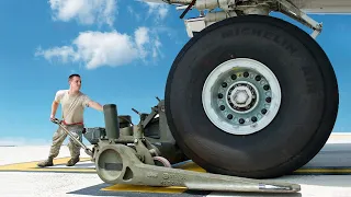 Changing Tires of a US C-17 Globemaster Aircraft