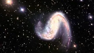 ZOOMING IN ON THE MEATHOOK GALAXY