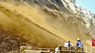 'Soil spraying' technique turns barren mountains green in N China