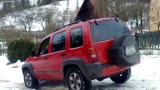 JEEP Liberty hill climb wet crystalic snow and water mixture